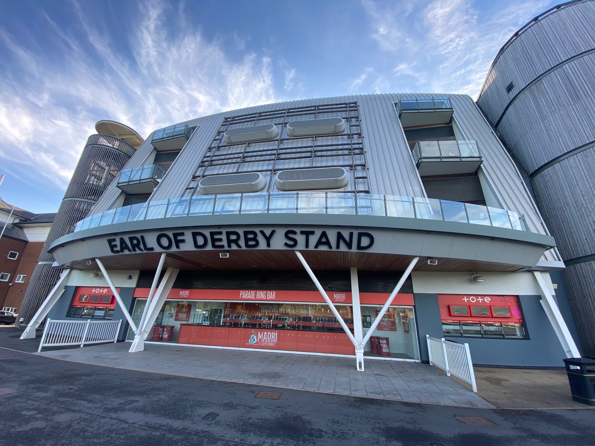 Outside shot showing the Earl of Derby suite on a sunny day at Aintree Racecourse in Liverpool.